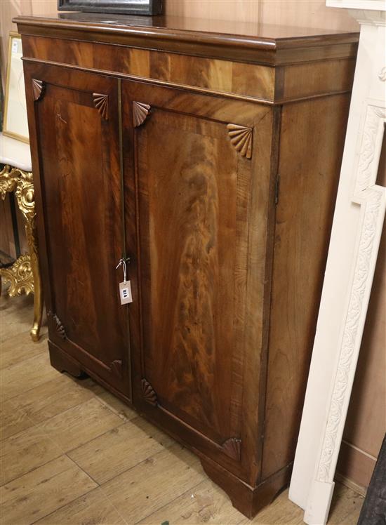 An early Victorian banded mahogany two door cupboard W.110cm